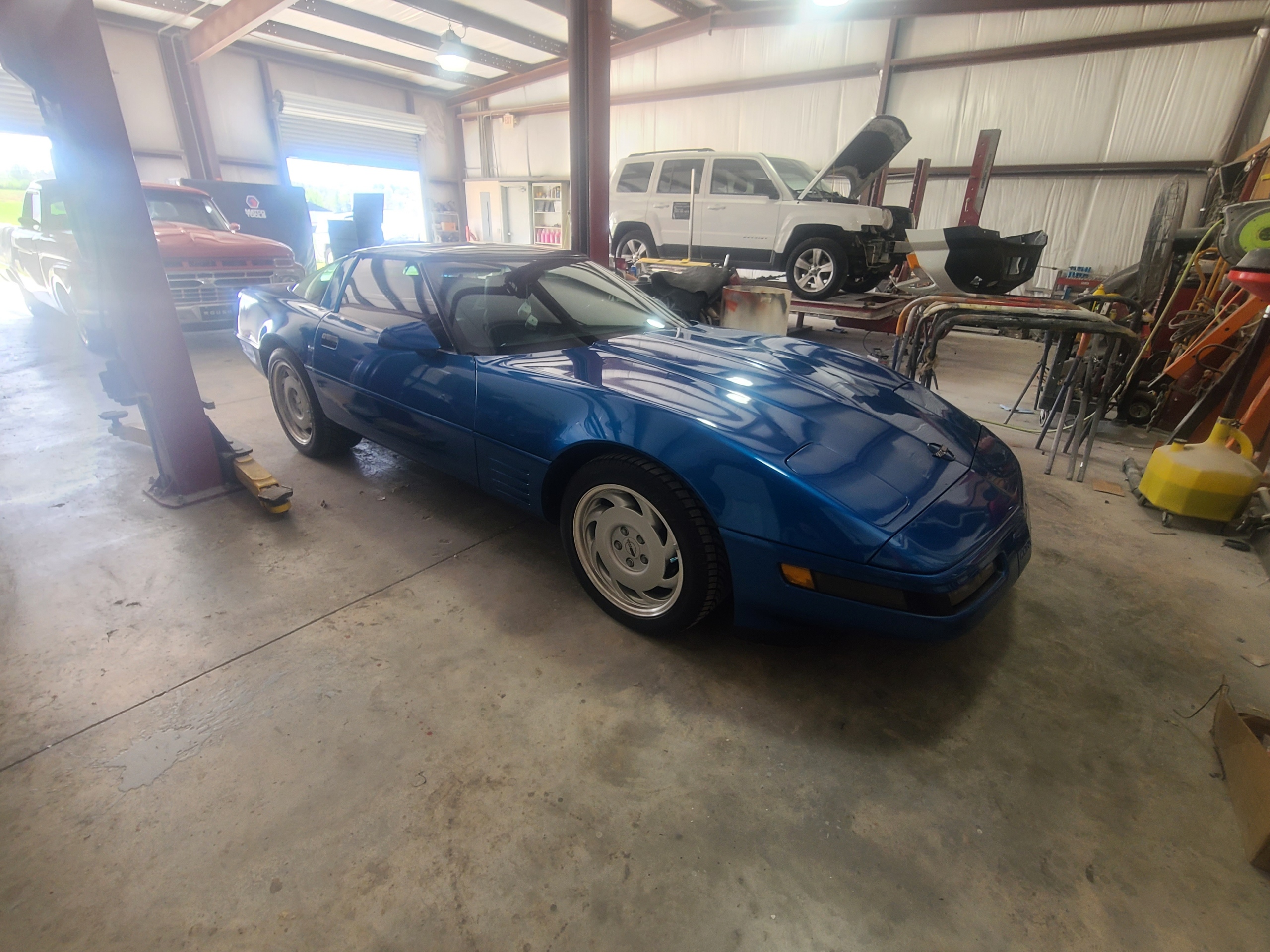 Classic blue Corvette undergoing restoration